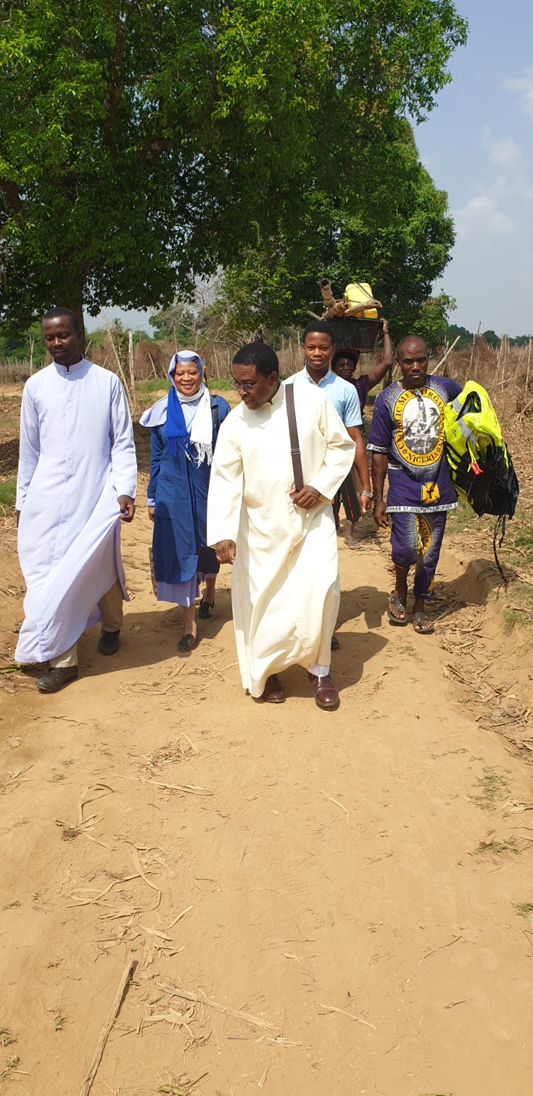 On foot trekking into Igbedor. We must take the Gospel to ends of the world!